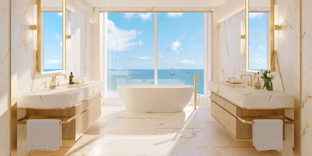 Luxurious oceanfront bathroom with floor-to-ceiling windows and a stunning ocean view. Bright, airy, and serene atmosphere.