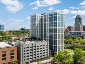 photo of Maeve, a newly built 20-story, 297-unit luxury community built by Capital Square in the Warehouse District of Raleigh, N.C. Capital Square has refinanced the property with a $105 million bridge loan from TPG Real Estate Finance that was arranged by Walker & Dunlop. Image courtesy of Capital Square.