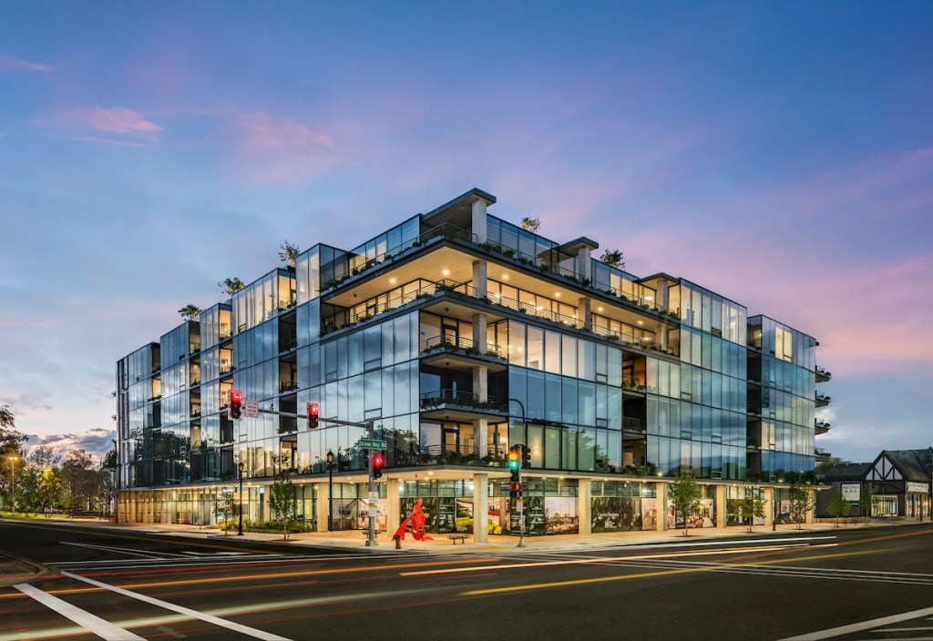 a photo of Optima Verdana, a 100-unit, luxury rental community in Wilmette, Ill., completed in 2023 by Optima, Inc. Walker & Dunlop arranged a nearly million construction take-out financing for the property provided by Freddie Mac.