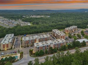 a photo of Resia Tributary, which has been renamed Sylvan Tributary, in Douglasville, Ga., courtesy of JLL. Resia sold Resia Tributary, a 433-unit apartment community in Douglasville, Ga., to Elmington Residential for approximately $73 million.