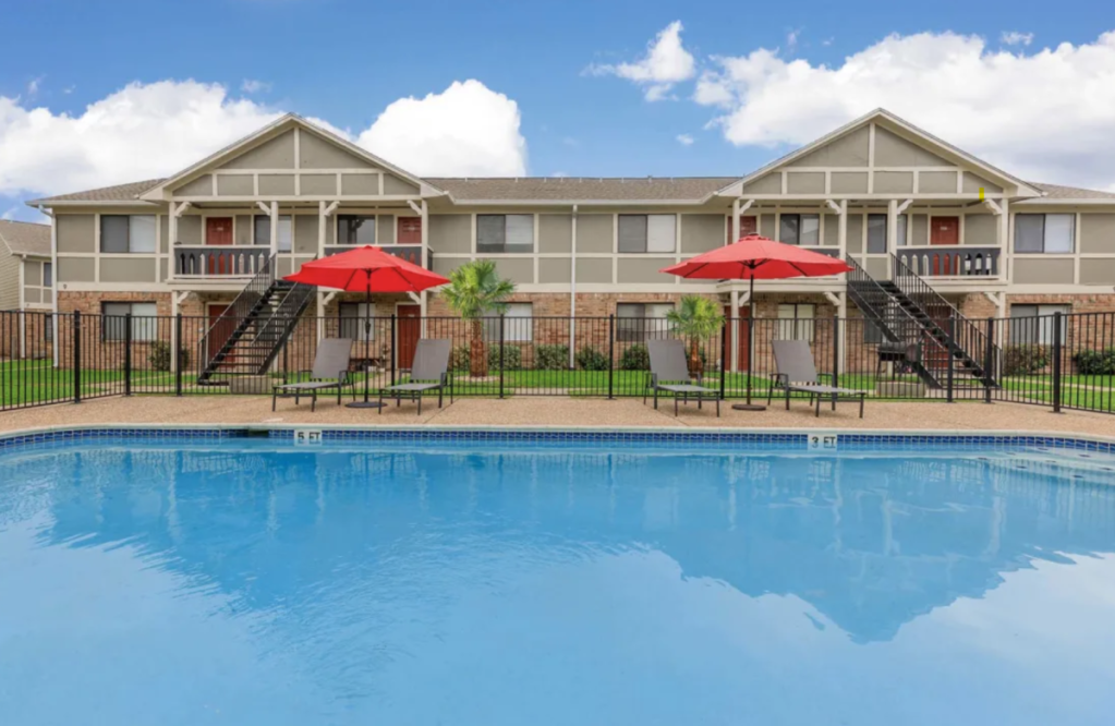 an image of a multifamily community with outdoor pool