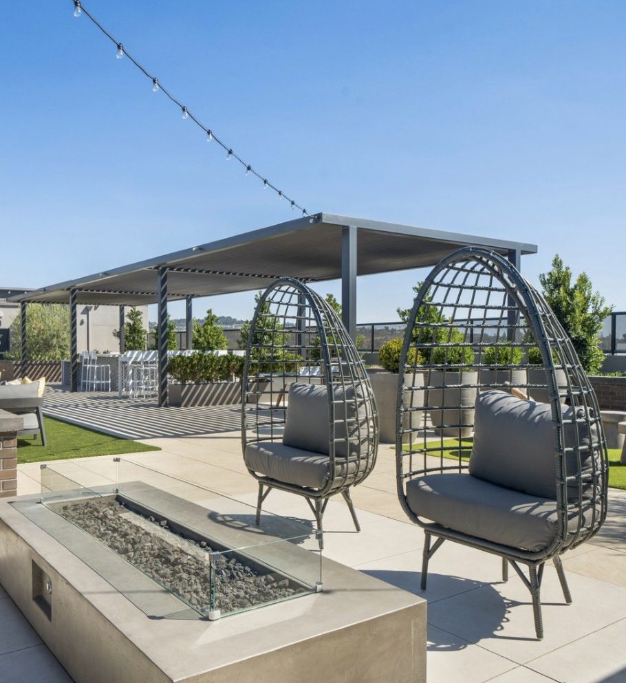 Social interaction meets wellness design on apartment rooftops, especially when an outdoor kitchen is in the mix. Image courtesy of Possibilities for Design