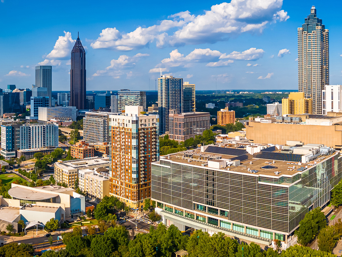 Atlanta Skyline with Midtown Towers Above Lush Urban Park in Summer Light