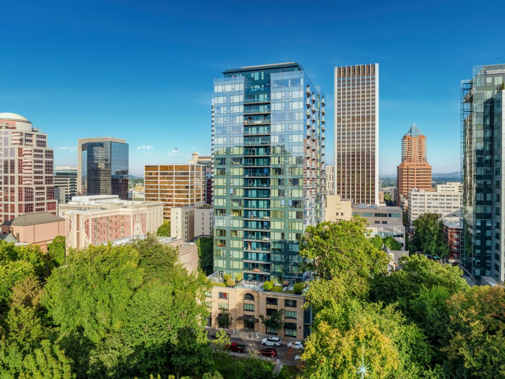 A photo of Ladd Tower, a 23-story, 332-unit Class A tower in downtown Portland, Ore., acquired by a joint venture of Guardian and PCCP for million.