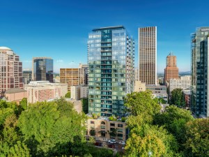A photo of Ladd Tower, a 23-story, 332-unit Class A tower in downtown Portland, Ore., acquired by a joint venture of Guardian and PCCP for $63 million.