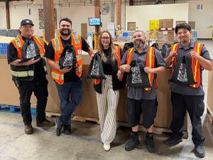 A photo of The Move for Hunger meal kit packing event, which took place at the 2026 Apartment Innovation and Marketing Conference