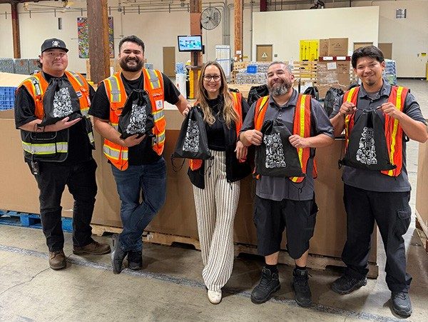 A photo of The Move for Hunger meal kit packing event, which took place at the 2026 Apartment Innovation and Marketing Conference