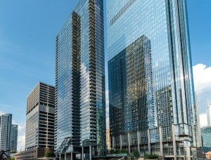 Exterior view of luxury riverfront multifamily property, the Wolf Point West, in Chicago.