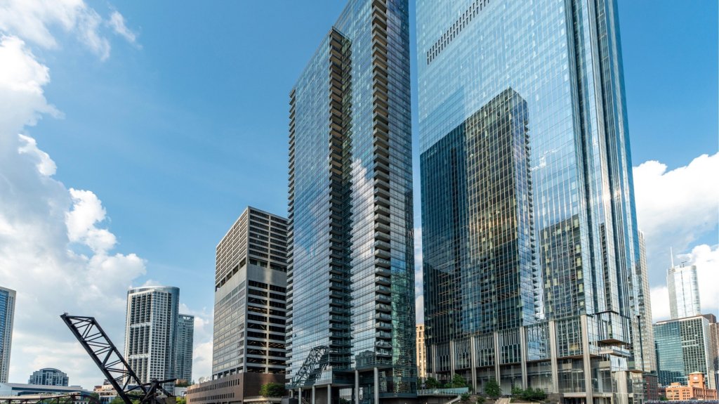 Exterior view of luxury riverfront multifamily property, the Wolf Point West, in Chicago.