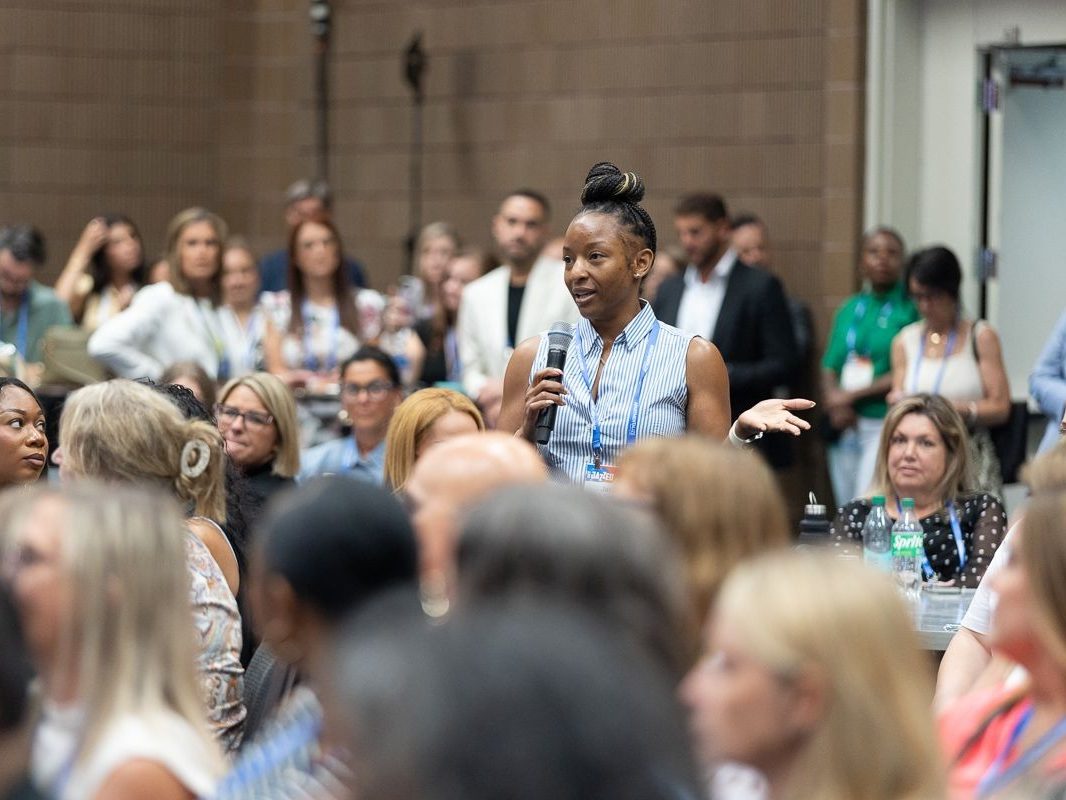 An attendee asks a question during a session at Apartmentalize.