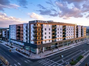 a photo of Kalaco, a 280-unit, mid-rise multifamily community in Denver built by Opus Development Co., LLC, and an Ares Real Estate fund, that was refinanced with a $67 million three-year loan arranged by JLL Capital Markets.
