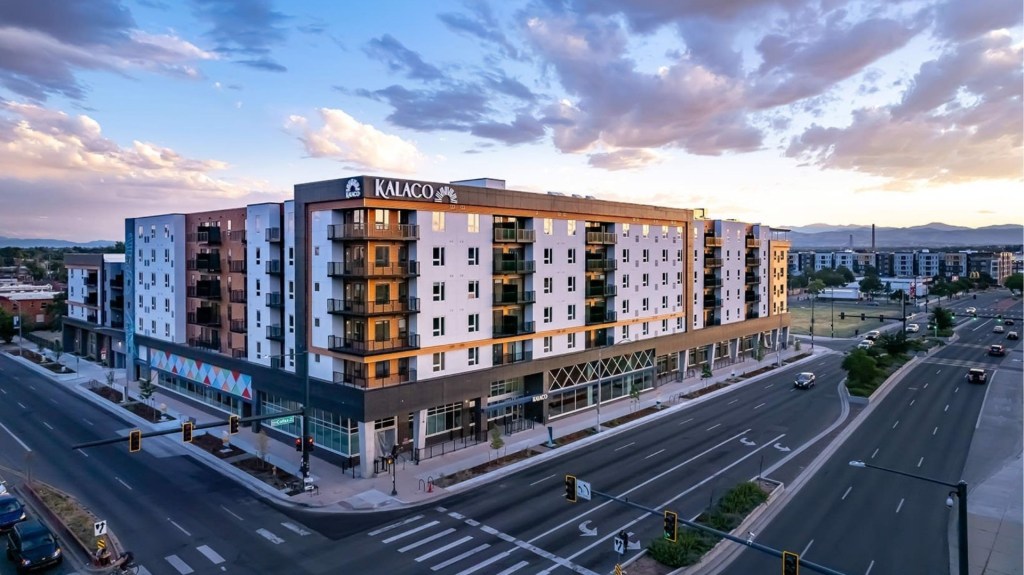 a photo of Kalaco, a 280-unit, mid-rise multifamily community in Denver built by Opus Development Co., LLC, and an Ares Real Estate fund, that was refinanced with a million three-year loan arranged by JLL Capital Markets.
