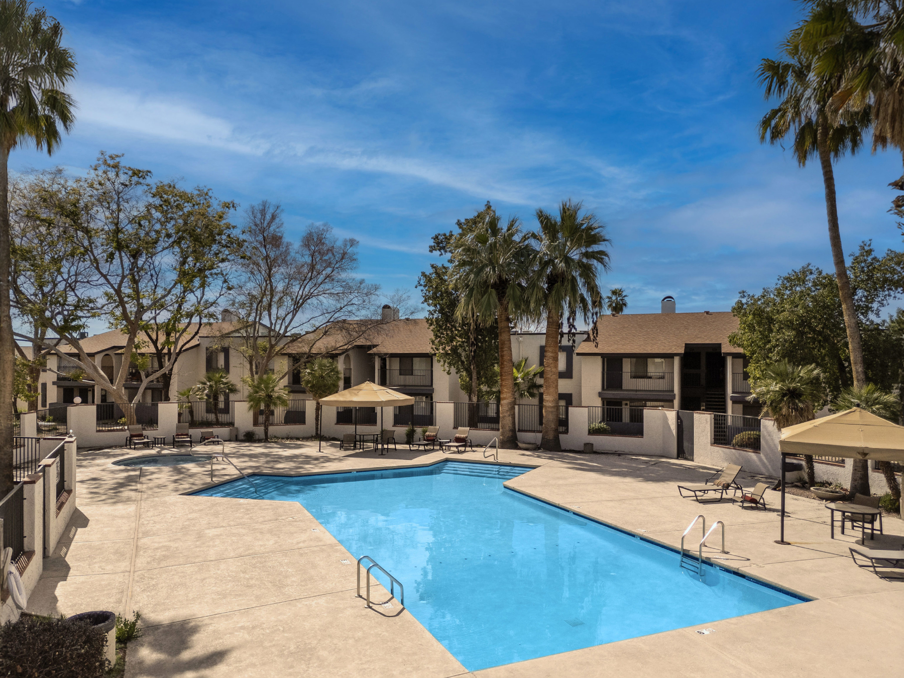 Exterior shot depicting the amenity package of Peaks at Redington.