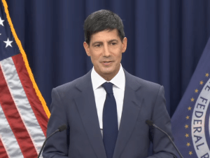Kevin Warsh speaks at the press conference following the June 17 announcement