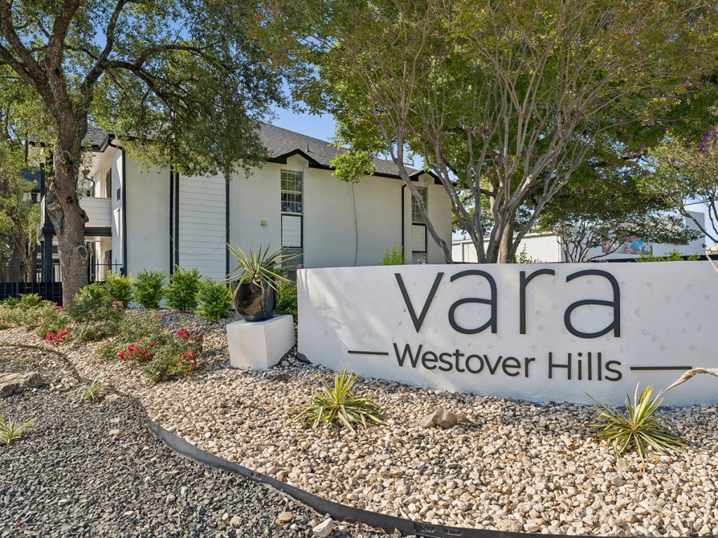 A photograph of the sign for Vara Westover Hills, an apartment community in San Antonio, Texas.