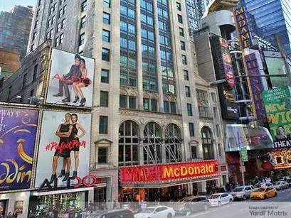 Exterior shot of the former office building at 221 W. 41st St. in Manhattan, which Yellowstone will convert to a residential community.
