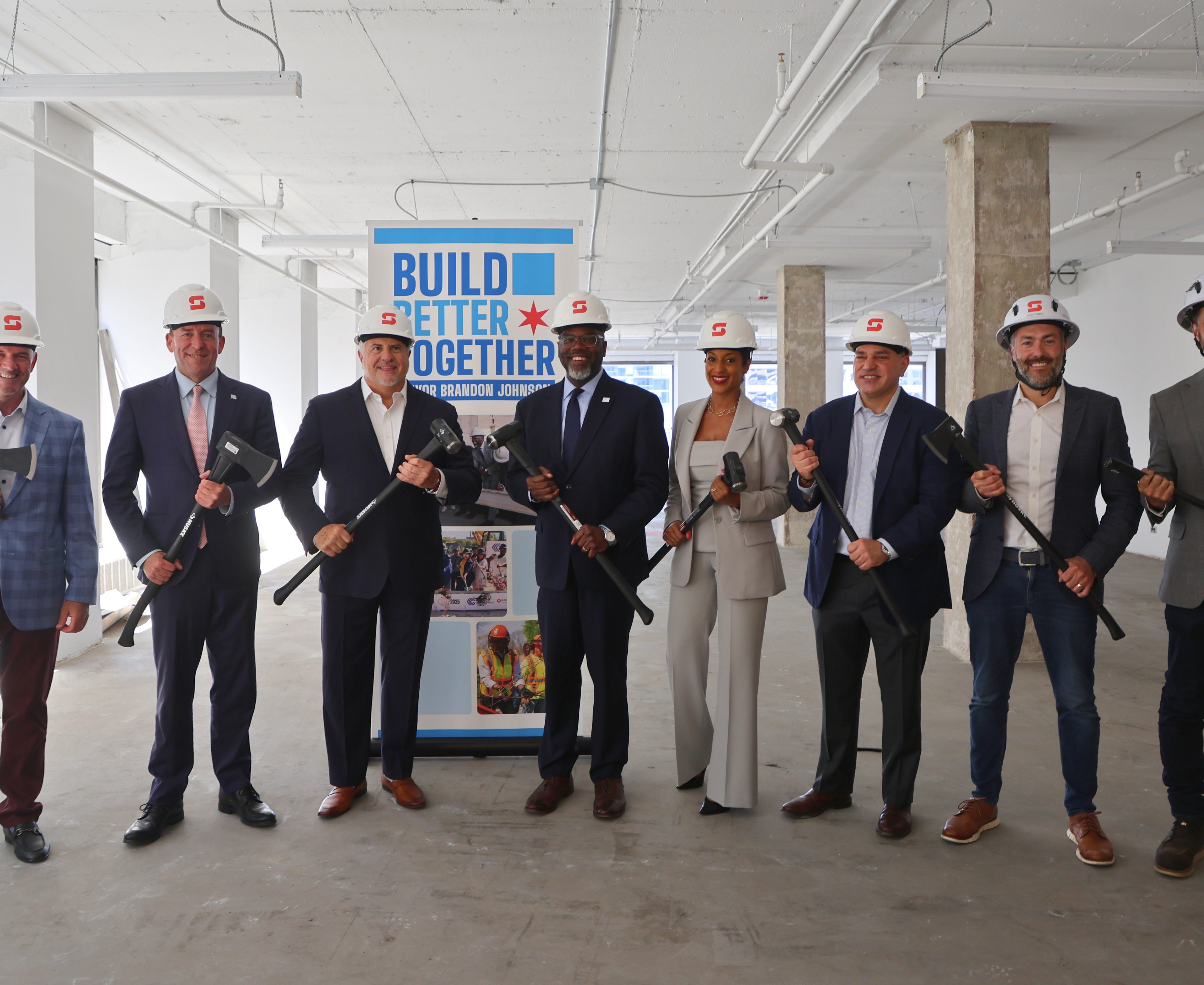 Skender officials at 500 N. Michigan Ave. in Chicago, were work began to convert the office building into a residential community.