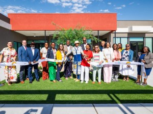 Exterior shot depicting the grand opening ceremony and ribbon cutting event at Beals Henderson Pointe, an affordable housing property in Las Vegas.