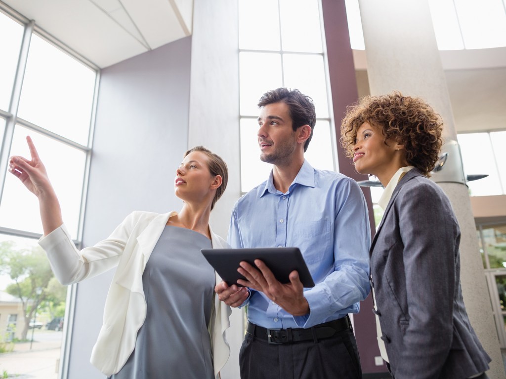 Executives with tablet