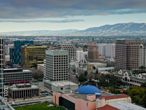 Aerial shot of San Jose, California at sunrise on a cloudy morning. Authorization was obtained from the FAA for this operation in restricted airspace.