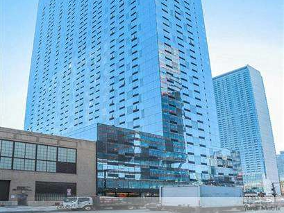 Exterior shot featuring the side of one of the three towers that make up the 1,872-unit Jackson Park in Long Island City, N.Y.