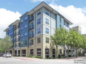 Exterior shot featuring one of the external buildings of Legacy North, a multifamily property in Plano, Texas.