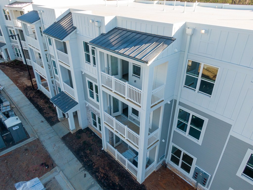 Drone shot of apartments, courtesy of Oak City Drone/AdobeStock