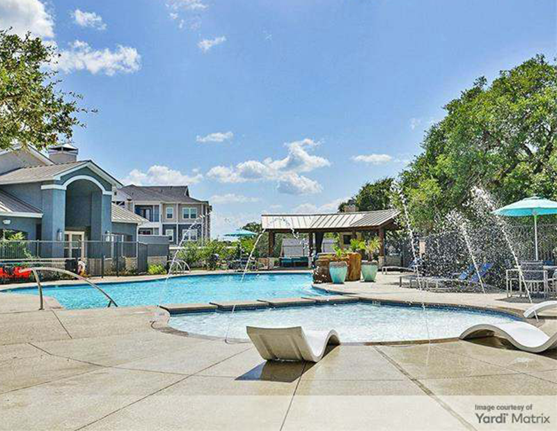 Pool with fountains at multifamily community in San Antonio