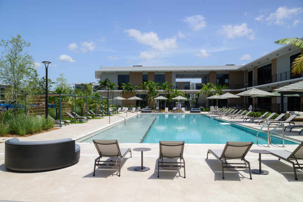 Exterior image of the swimming pool within Upland Park, a mixed-use community in Miami.