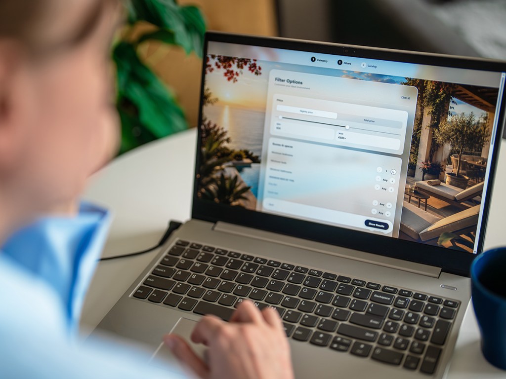 woman searching an apartment website