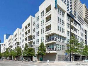 Exterior shot featuring The Arts, a multifamily property in downtown Dallas acquired by Bader from GF Properties.