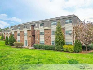 Exterior shot of a residential building within Collins Crossing, a 29-property community in Carrboro, N.C.