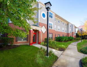 Image of the front of Jade Garden Apartments in Chicago's Chinatown neighborhood.