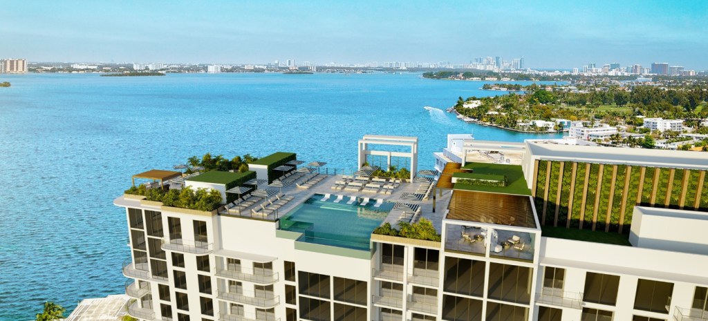 Aerial image of the rooftop deck with two swimming pools at Shoma Bay, a condominium project in North Bay Village, Fla.