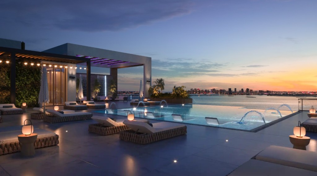 A rendering of the rooftop pool deck, part of the amenity package at Shoma Bay, a condominium development.