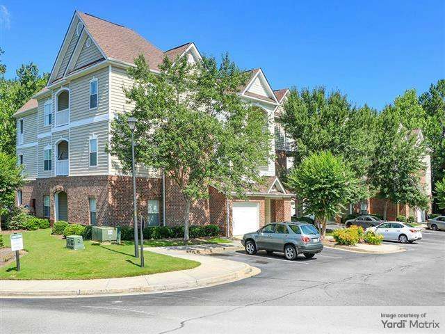 Exterior image with a building part of Villas at West Ridge, a residential community in suburban Atlanta.