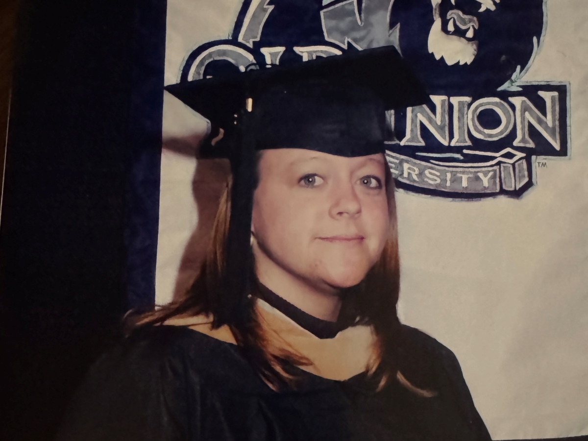 headshot of Angie Loew at graduation