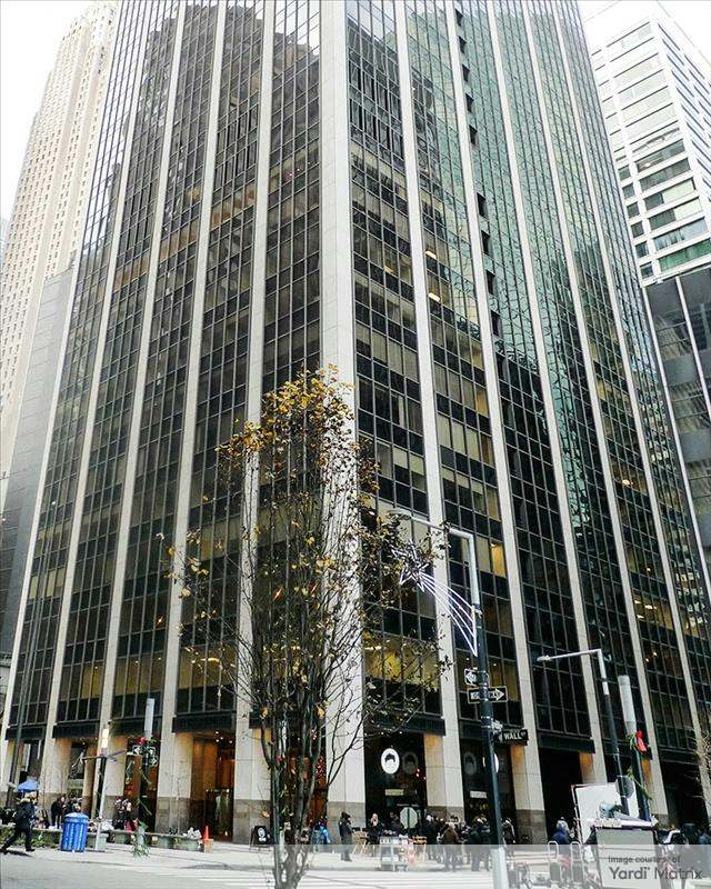 Exterior shot of 100 Wall St., a 29-story office building to be partially turned into a residential community.