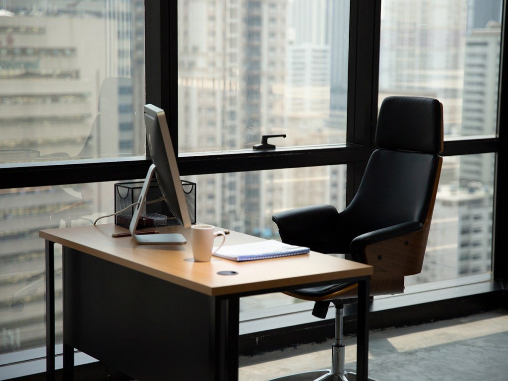 office interior with a table and chairs - for the AI leasing handoff Q&A with Lisa Trosien