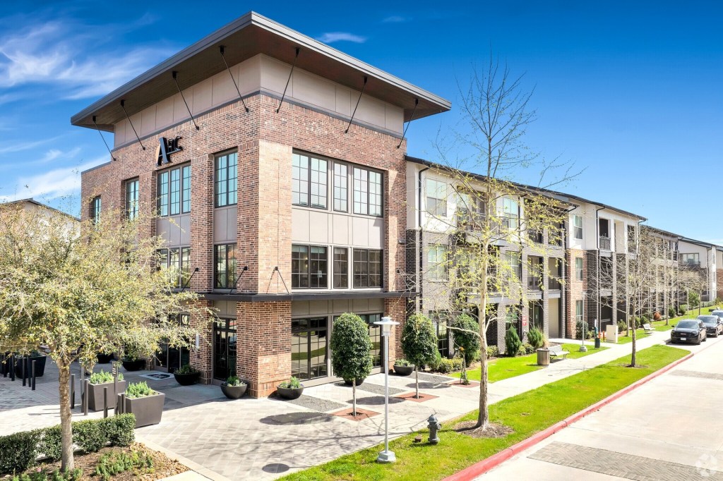 A photo of Arc at the Grid, a Class A multifamily community owned by Lone Star Funds in the Houston suburb of Stafford, Texas.