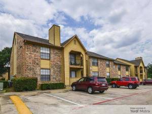 Exterior shot depicting one of the buildings that make up Wythe Apartment Homes in Irving, Texas.