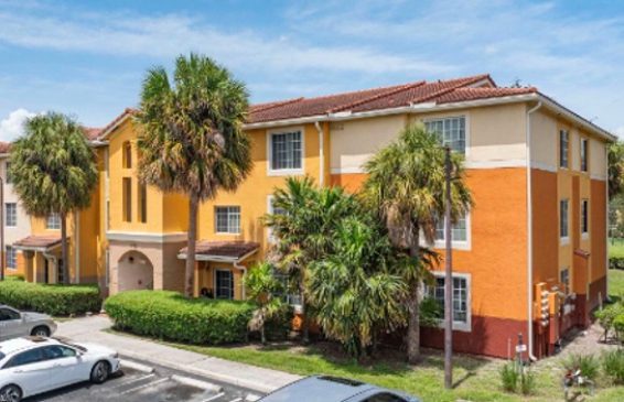 A photo of Palm Park Apartment Homes, a 160-unit affordable housing community in Boynton Beach, Fla. Last month, April Housing extended the affordability of the property for at least 30 years