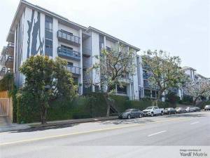 Exterior shot featuring one of the two buildings that make up Violet on Virgil, a multifamily property in Los Angeles.