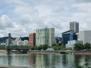 The Pacific Northwest city of Portland downtown, historic Hawthorne Bridge and the Willamette River.