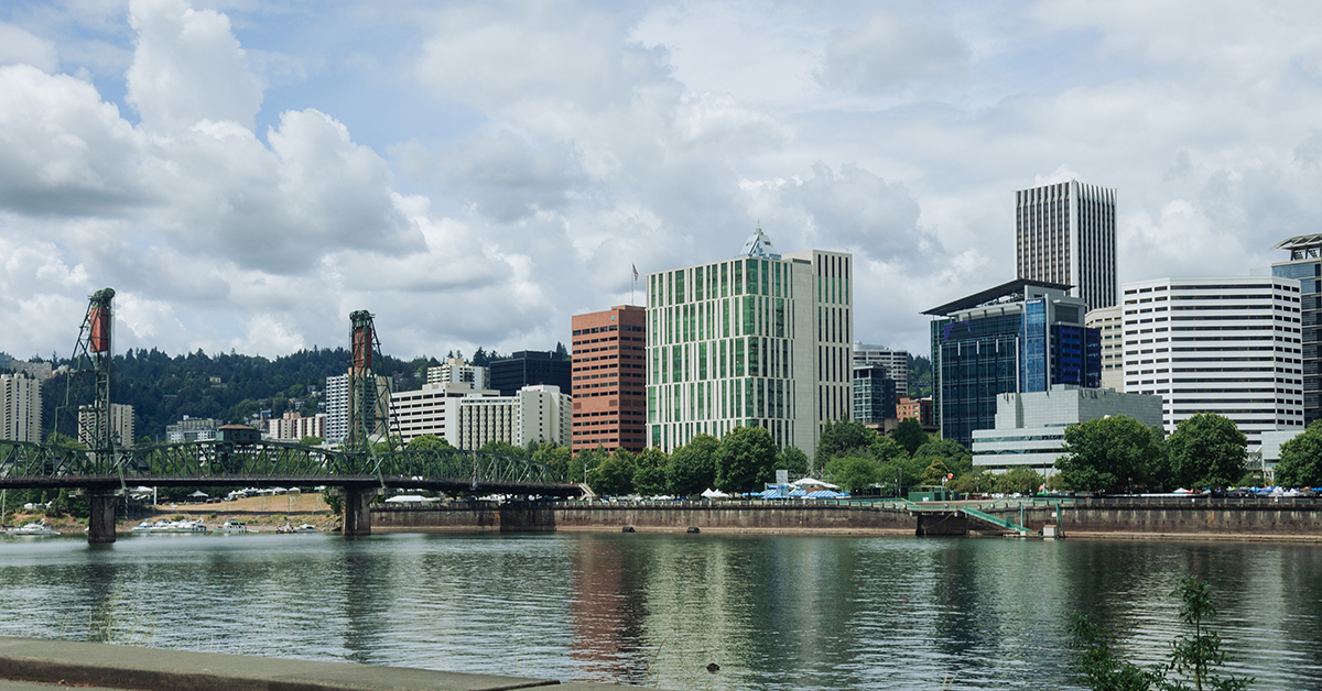 The Pacific Northwest city of Portland downtown, historic Hawthorne Bridge and the Willamette River.