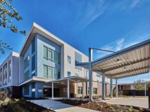 Exterior rendering of the completed The Meadow affordable housing rehabilitation project in Dallas.